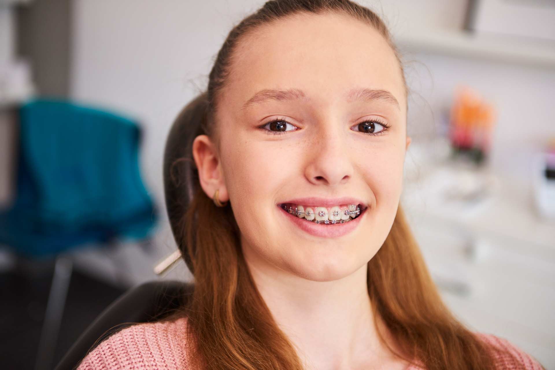 Teen smiling with braces